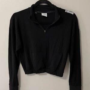 Black pullover Gymshark quarter zip. Worn twice. Great condition.